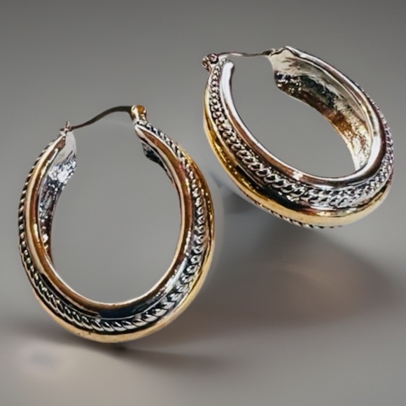 Heavy silver and goldtone costume earrings